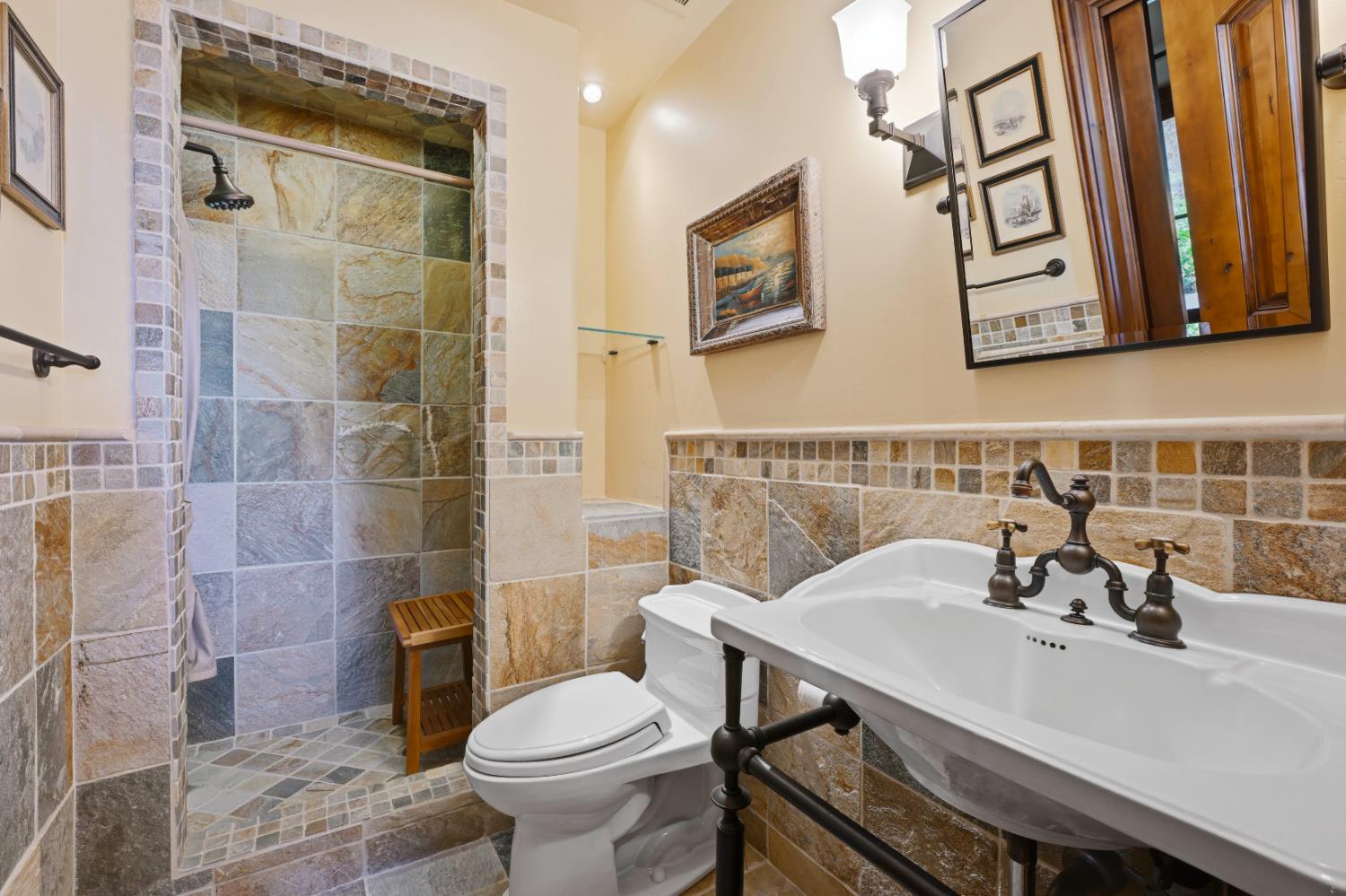 2581 Shirland Tract Road Auburn, CA 95603 - Photo 26 of 61 a bathroom with a sink toilet and shower