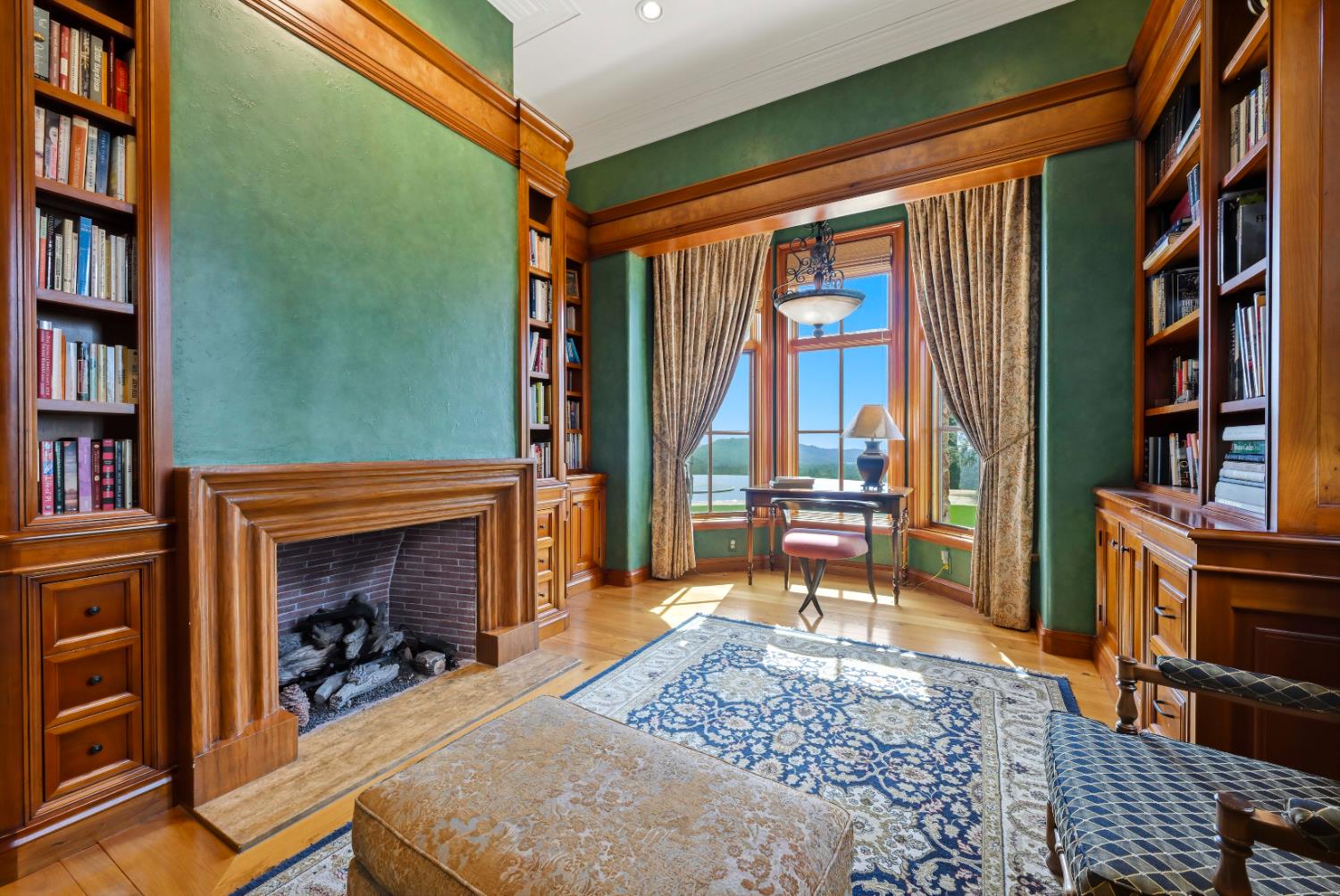 2581 Shirland Tract Road Auburn, CA 95603 - Photo 30 of 61 a bedroom with furniture and a fireplace