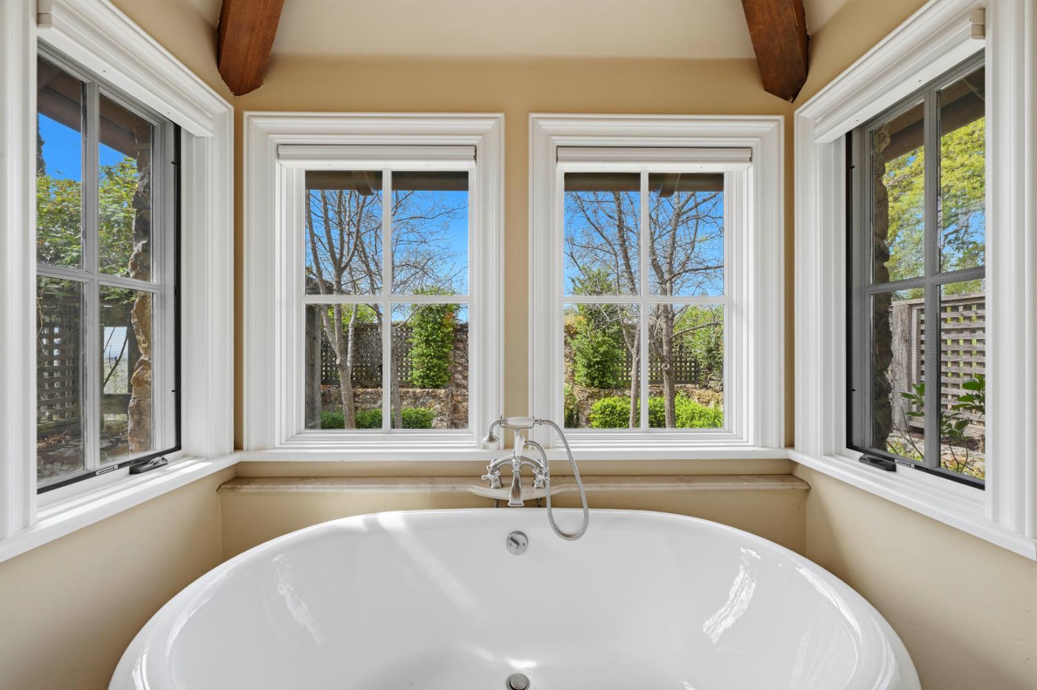 2581 Shirland Tract Road Auburn, CA 95603 - Photo 35 of 61 a white bath tub sitting in front of a window