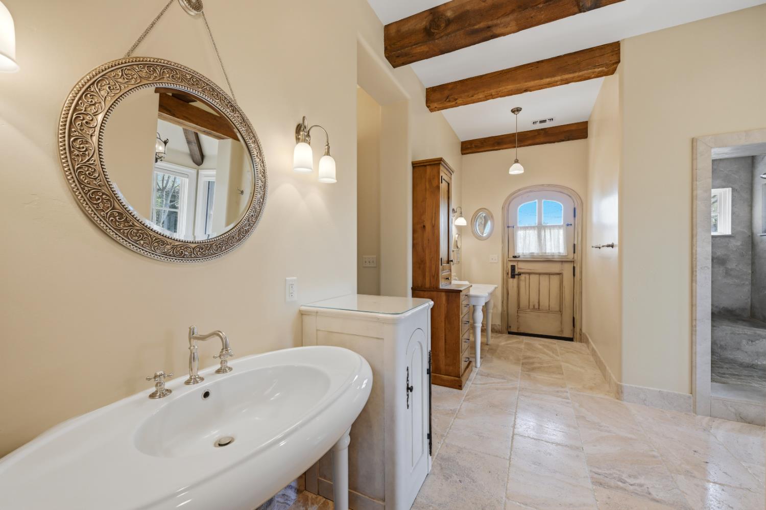 2581 Shirland Tract Road Auburn, CA 95603 - Photo 36 of 61 a spacious bathroom with a sink and a mirror