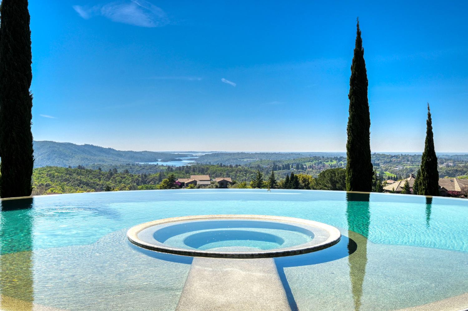 2581 Shirland Tract Road Auburn, CA 95603 - Photo 49 of 61 a view of a swimming pool with a mountain view