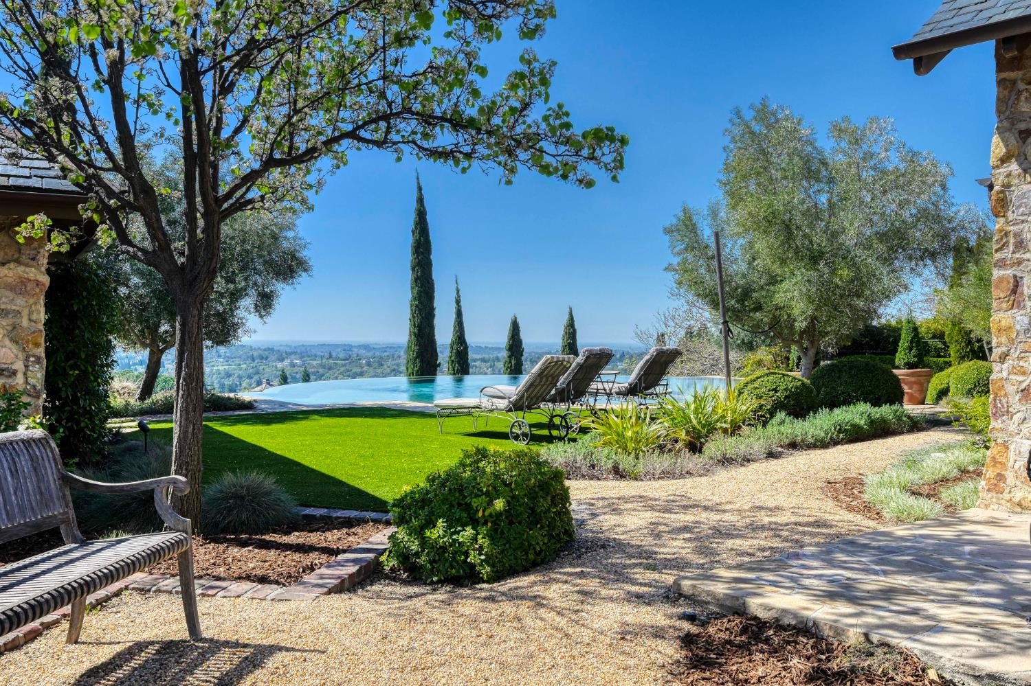 2581 Shirland Tract Road Auburn, CA 95603 - Photo 50 of 61 a front view of a house with garden