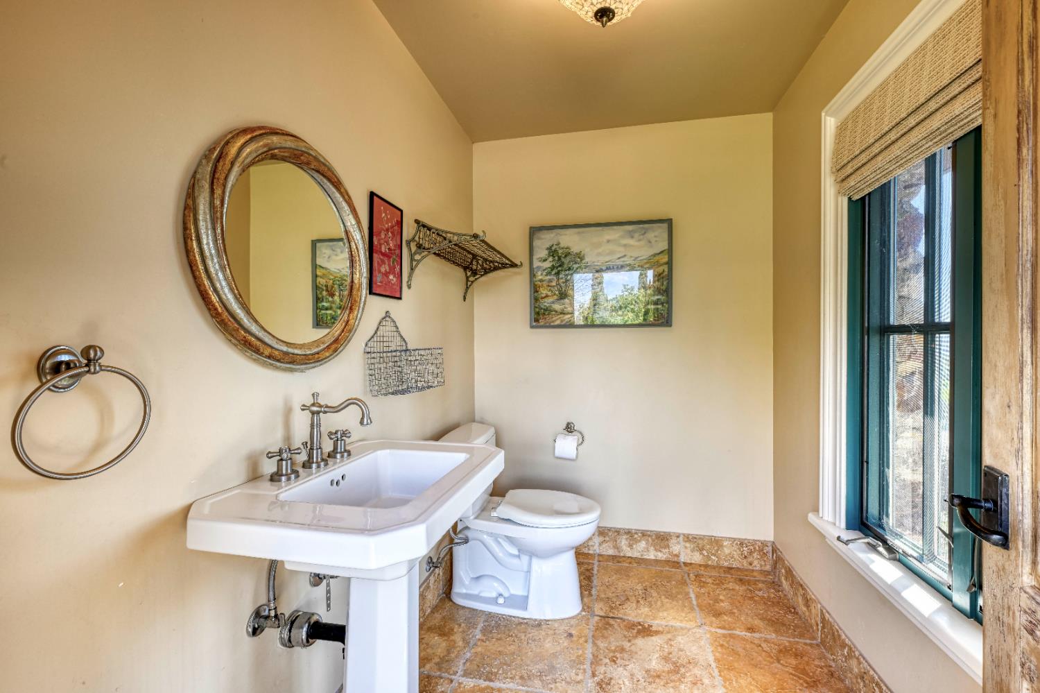 2581 Shirland Tract Road Auburn, CA 95603 - Photo 52 of 61 a bathroom with a sink and a mirror