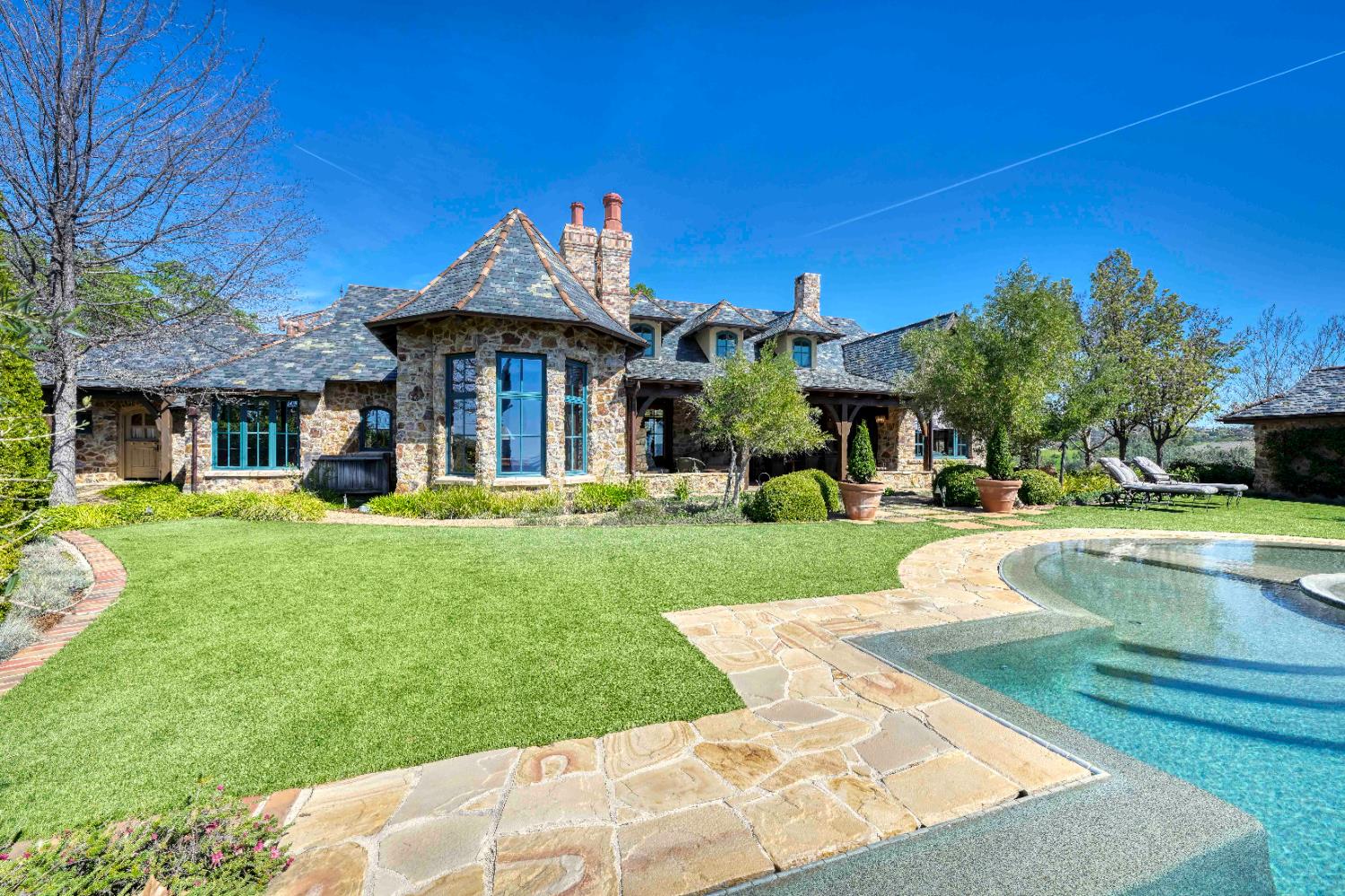 2581 Shirland Tract Road Auburn, CA 95603 - Photo 55 of 61 a front view of a house with garden