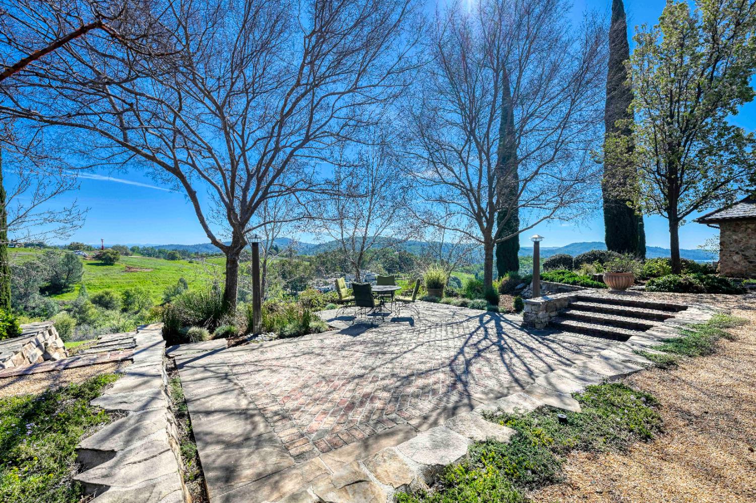 2581 Shirland Tract Road Auburn, CA 95603 - Photo 57 of 61 a view of a bench in the backyard of a house