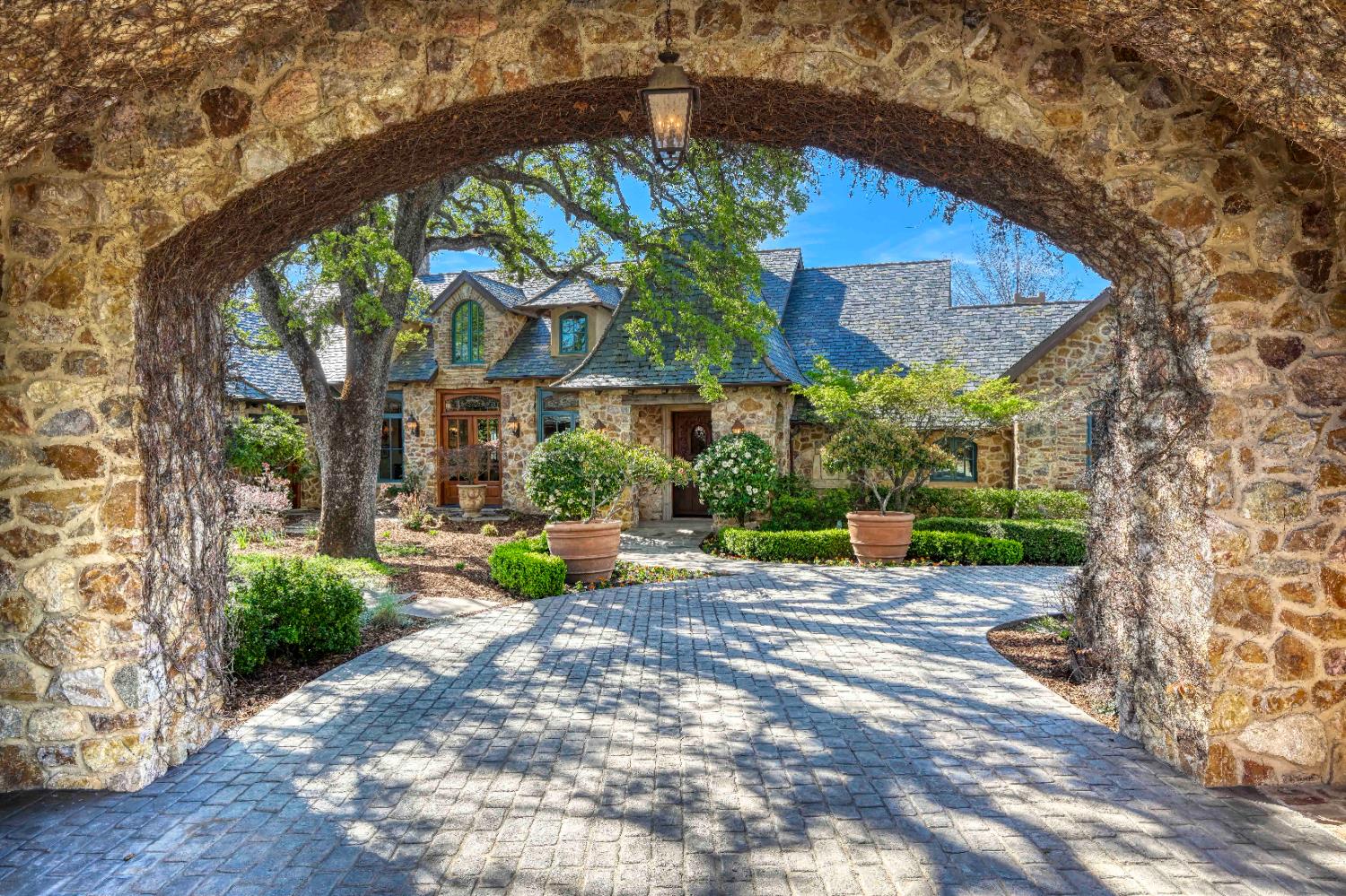2581 Shirland Tract Road Auburn, CA 95603 - Photo 6 of 61 a view of a house with a small yard and a large tree