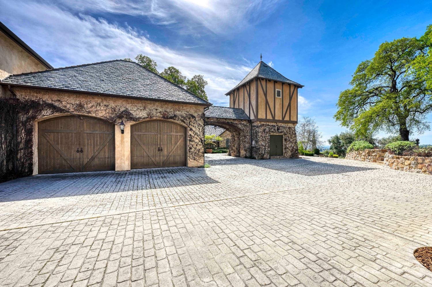 2581 Shirland Tract Road Auburn, CA 95603 - Photo 10 of 61 a front view of a house with a yard and garage