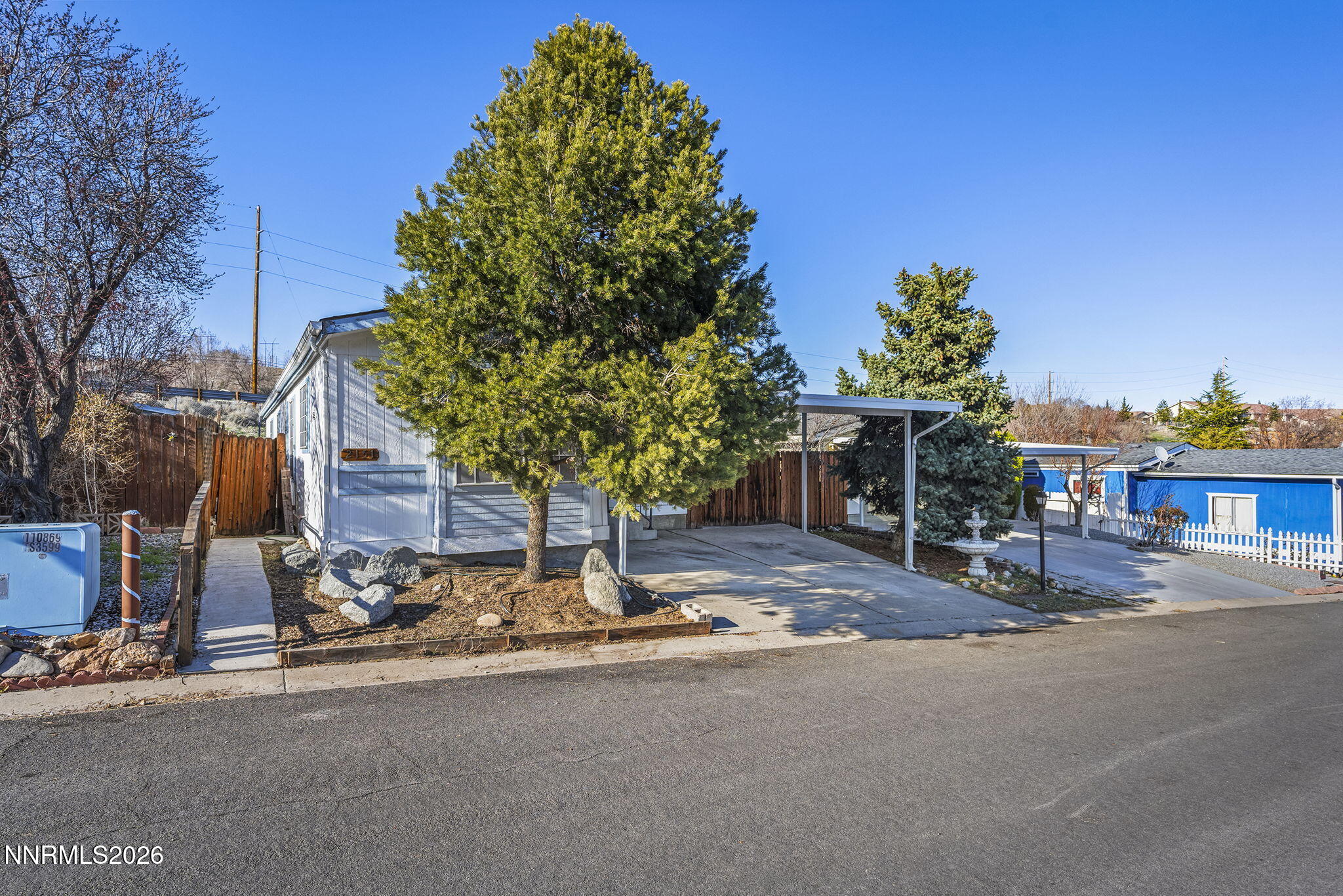 2151 Barberry Way Reno, NV 89512 - Photo 16 of 16 a house with trees in the background