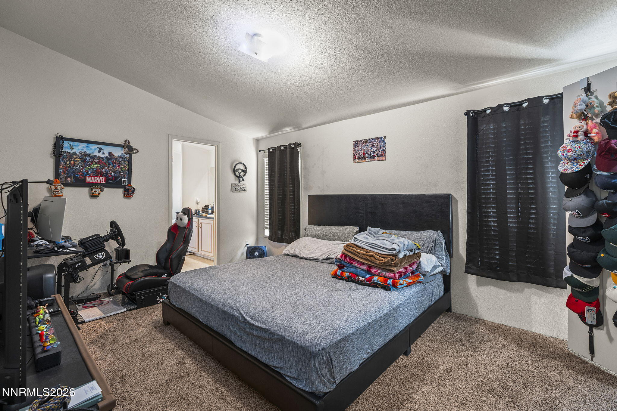 2151 Barberry Way Reno, NV 89512 - Photo 8 of 16 a bedroom with a bed and a couch