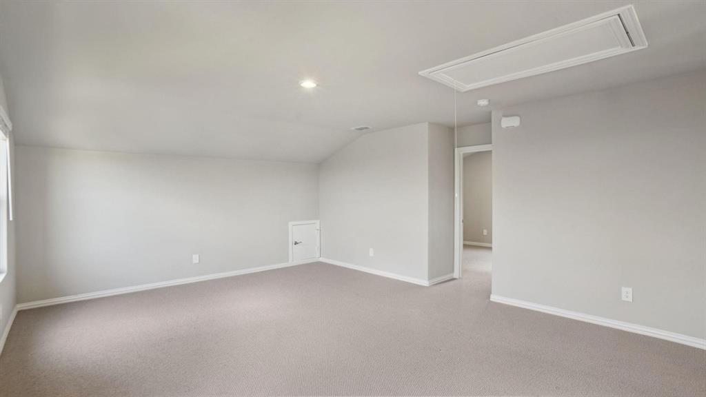 1728 Arches Road Anna, TX 75409 - Photo 10 of 11 Additional living space featuring carpet, attic access, recessed lighting, and lofted ceiling