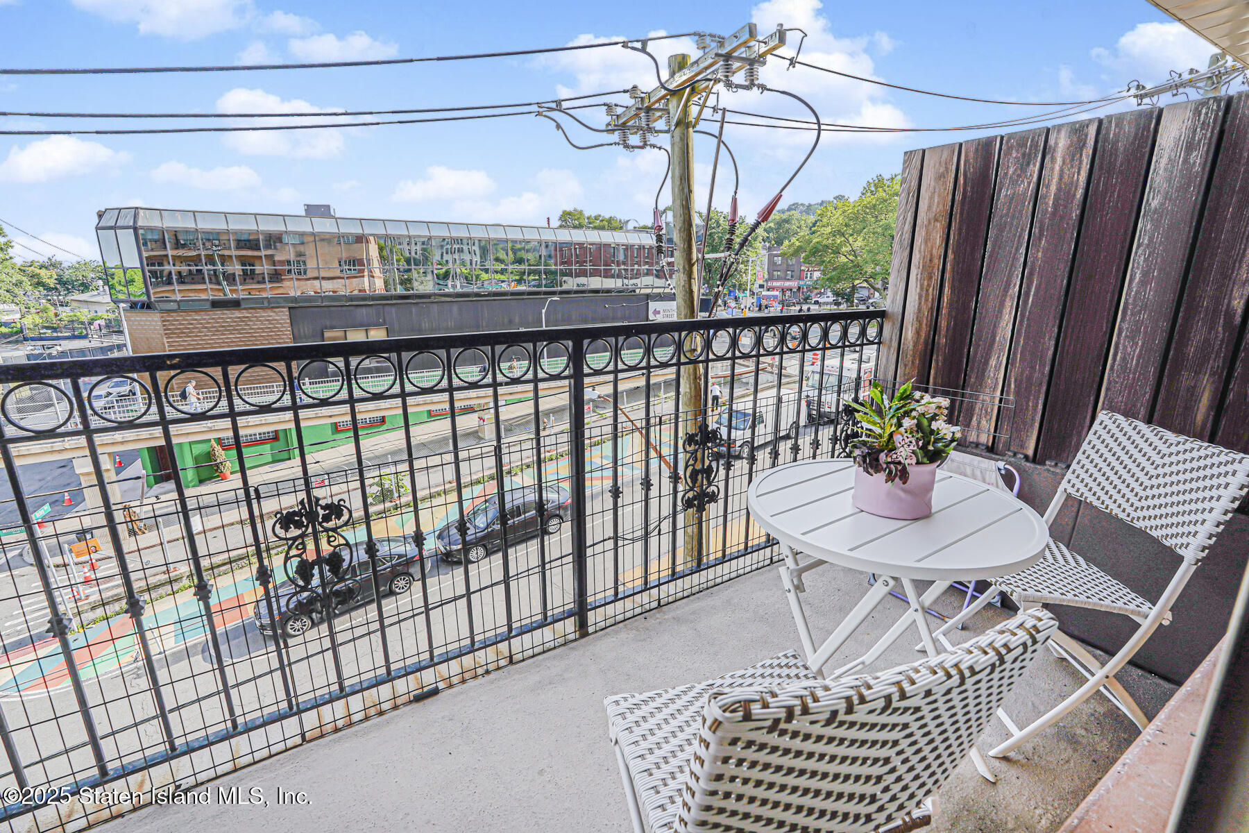155 Bay Street, Unit 2L Staten Island, NY 10301 - Photo 13 of 32 a view of a balcony with furniture
