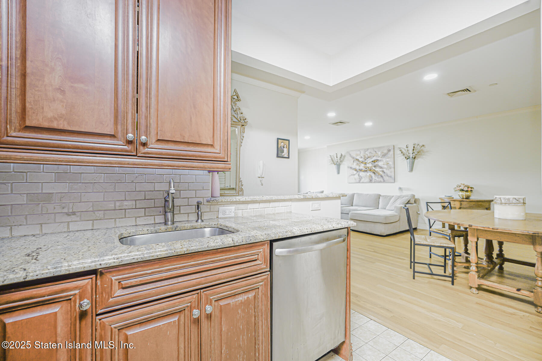 155 Bay Street, Unit 2L Staten Island, NY 10301 - Photo 20 of 32 a kitchen with a sink and cabinets
