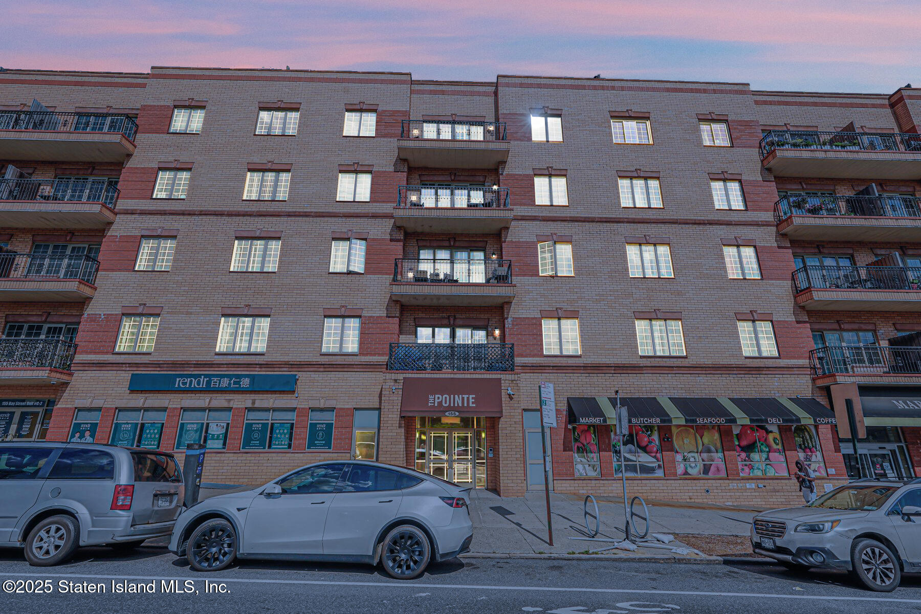 155 Bay Street, Unit 2L Staten Island, NY 10301 - Photo 2 of 32 a car parked in front of a building