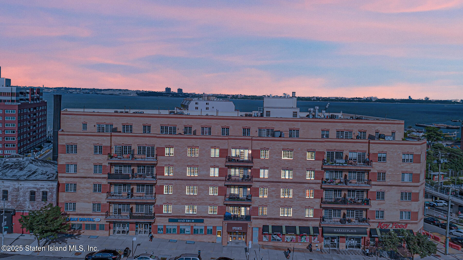 155 Bay Street, Unit 2L Staten Island, NY 10301 - Photo 29 of 32 a view of a large building with a city view