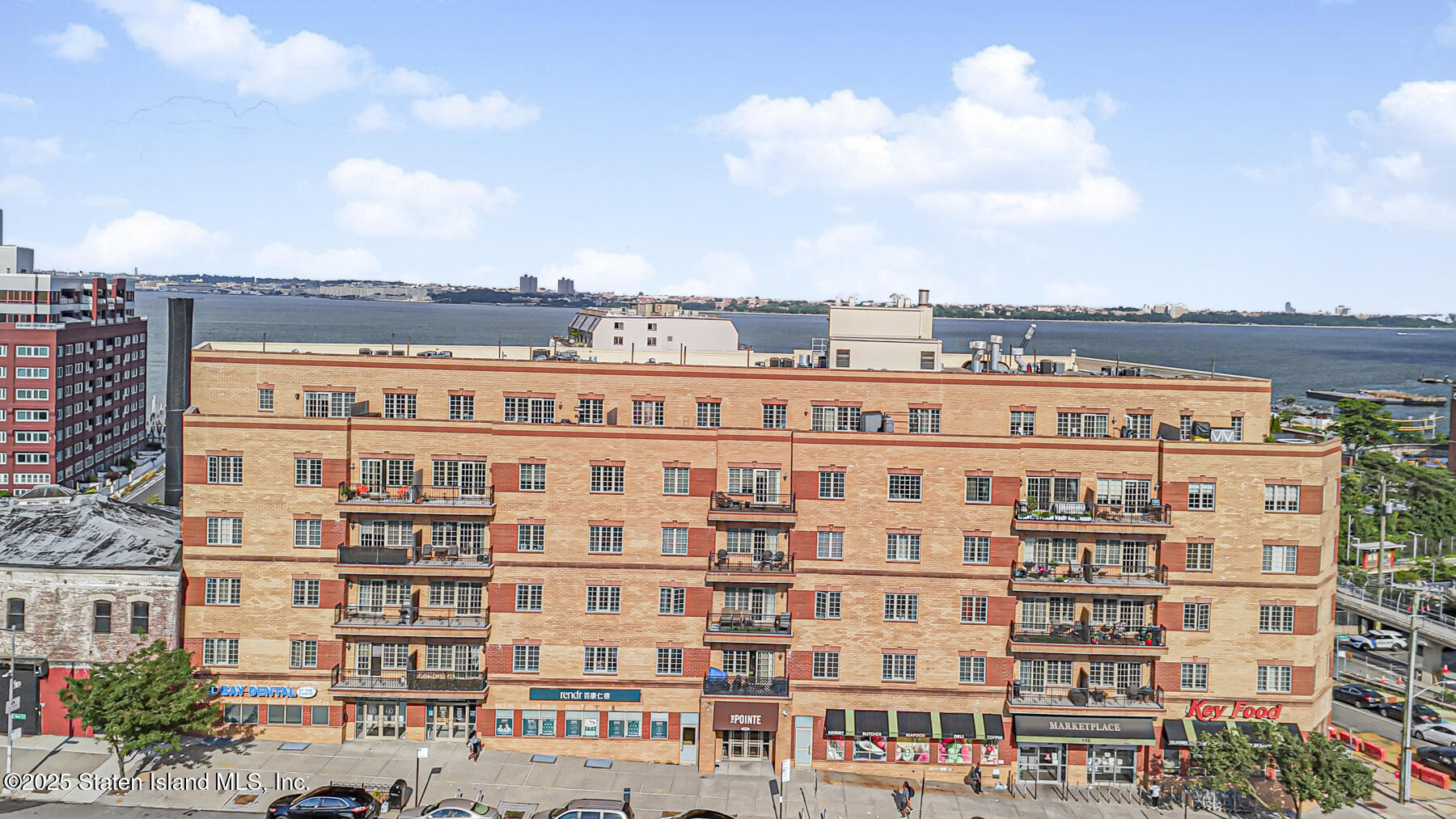 155 Bay Street, Unit 2L Staten Island, NY 10301 - Photo 31 of 32 a view of a building with a city street