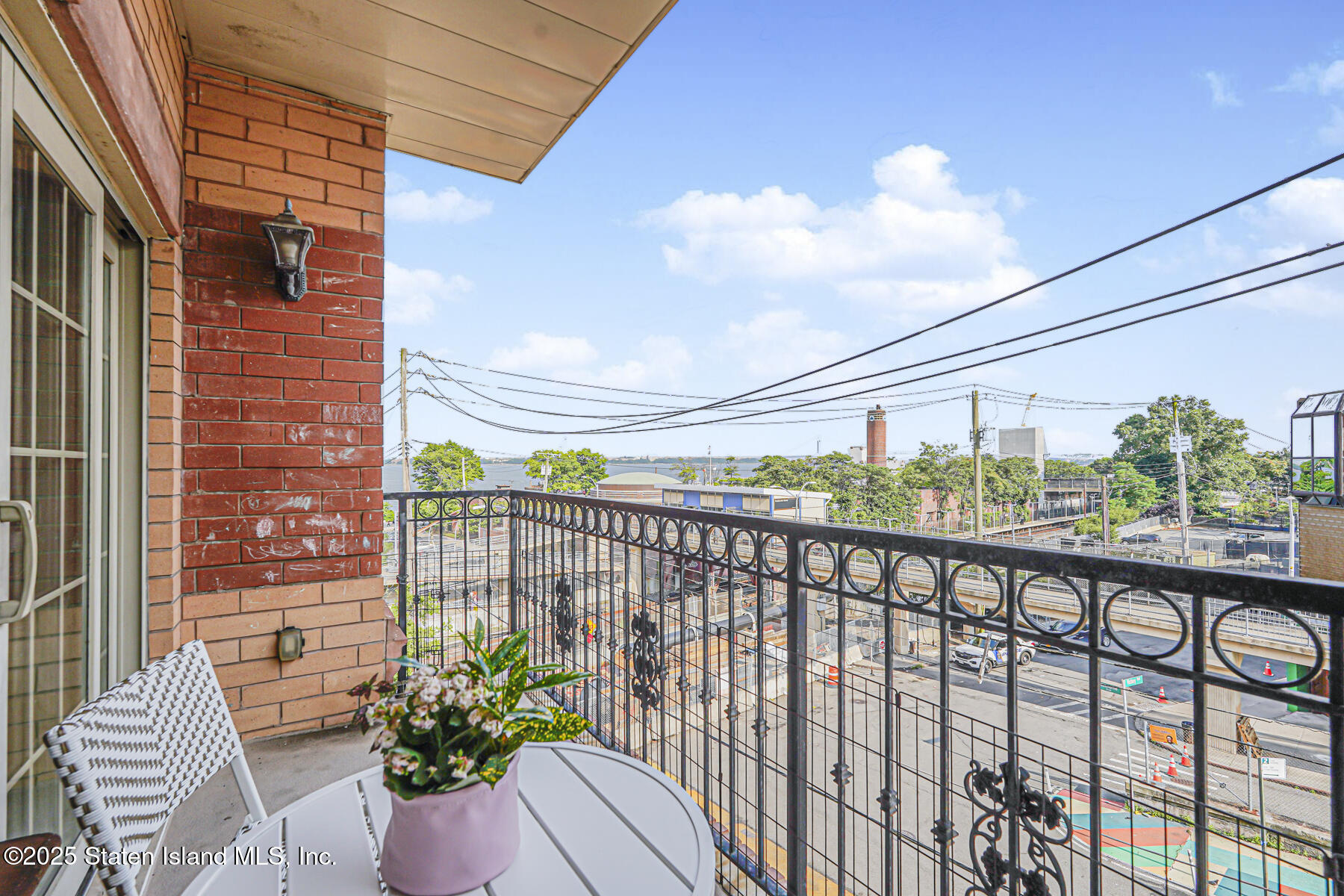 155 Bay Street, Unit 2L Staten Island, NY 10301 - Photo 10 of 32 a view of a balcony with potted plants