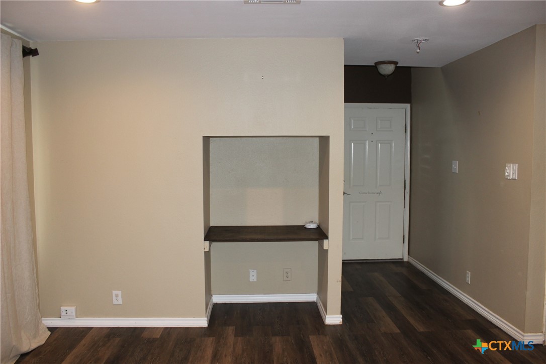 7710 Fallen Pine Converse, TX 78109 - Photo 4 of 19 a view of empty room with wooden floor
