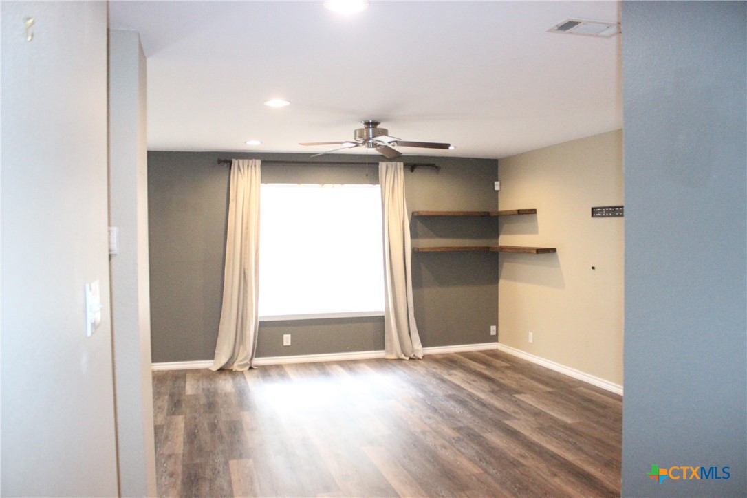7710 Fallen Pine Converse, TX 78109 - Photo 6 of 19 an empty room with a empty space and windows