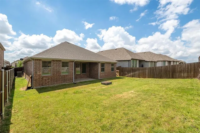 a bathroom with a bathtub toilet sink vanity and shower