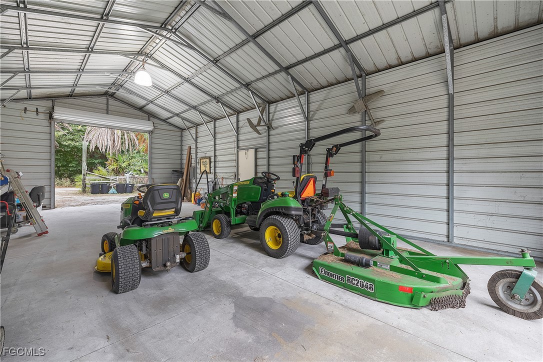 15890 Quail Trail Bokeelia, FL 33922 - Photo 4 of 18 a view of a chairs and tables in a patio