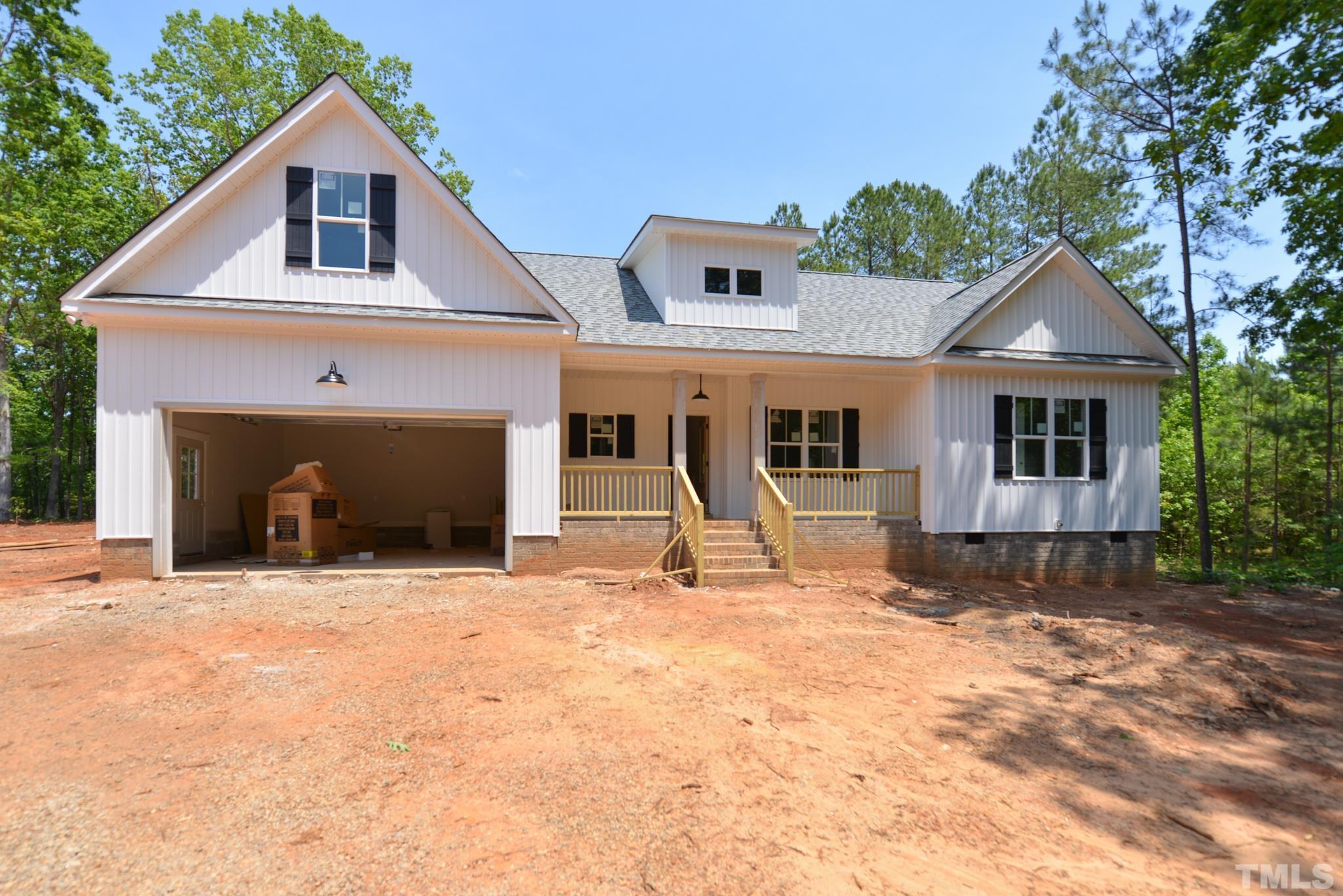 968 Barnes Road Middlesex, NC 27557 - Photo 2 of 31 a front view of a house with a yard