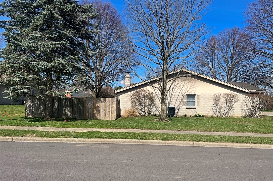 920 North Dorset Road, Unit 920 Troy, OH 45373 - Photo 17 of 18 This charming home offers a serene backdrop, perfect for peaceful living.