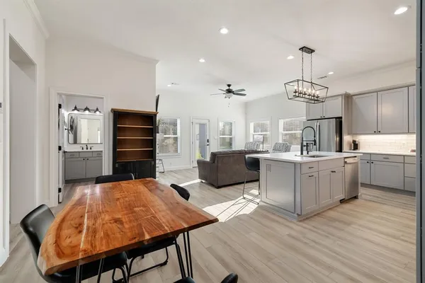 an aerial view of house with yard swimming pool and outdoor seating