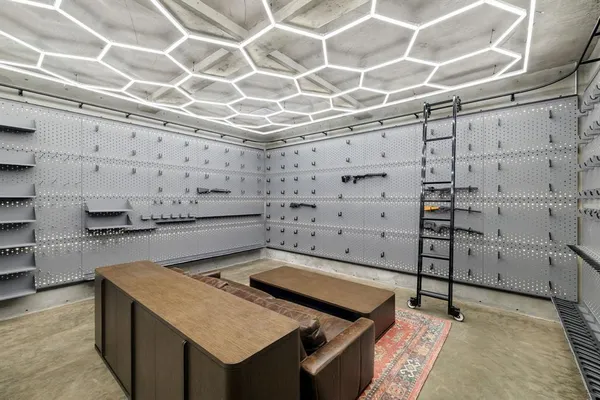 a room with a bed and furniture