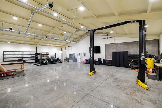 a bedroom with furniture and a bed