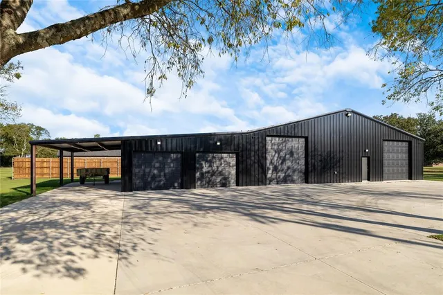 a living room with lots of furniture and a flat screen tv