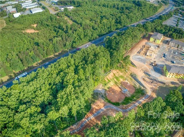 0 Bluefield Road Mooresville, NC 28117 - Photo 5 of 8 an aerial view of a house with a yard