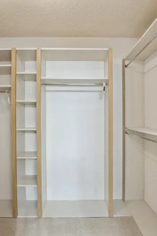 a view of house with outdoor space and swimming pool