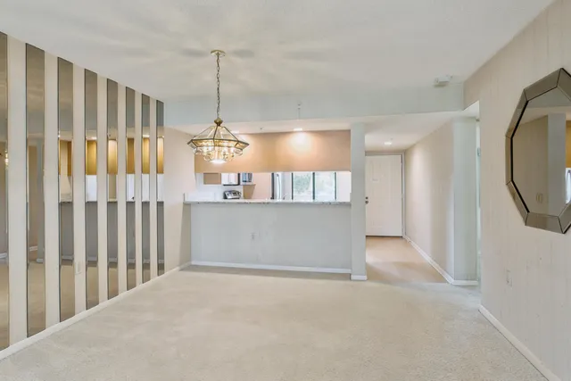 a bathroom with a toilet and shower