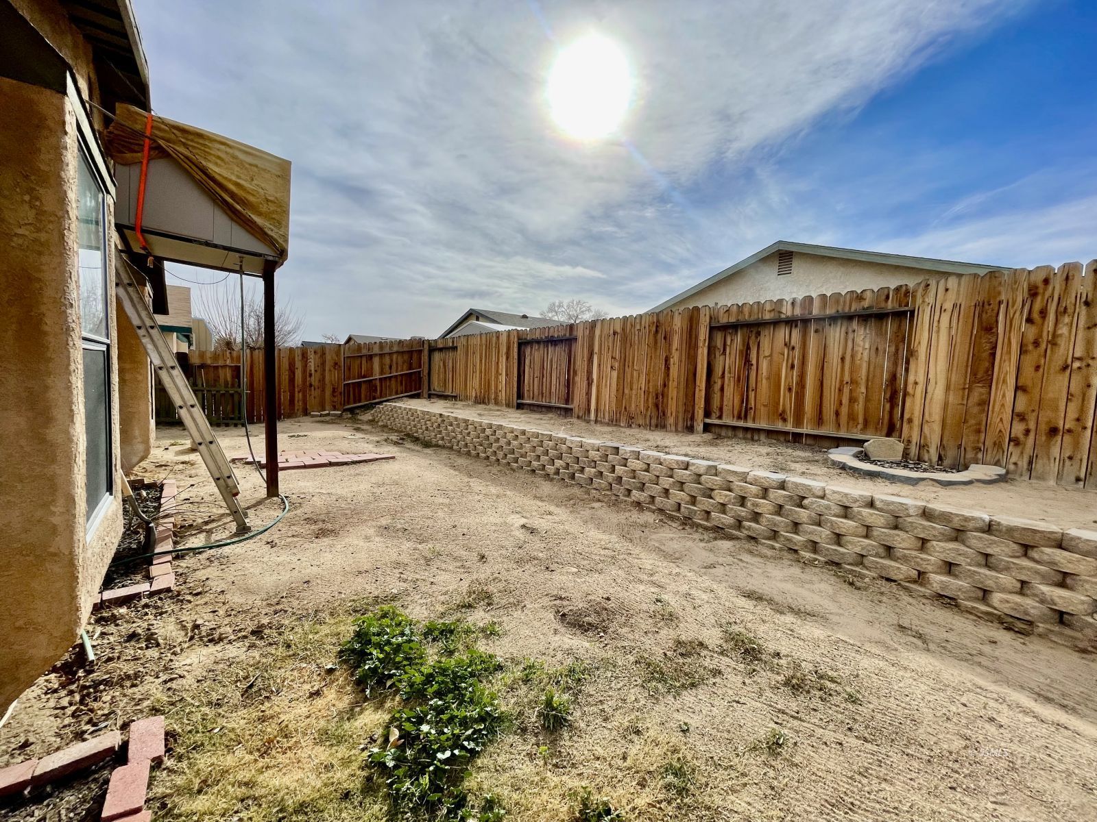 225 Michele Street Ridgecrest, CA 93555 - Photo 28 of 36 a view of a backyard of a house