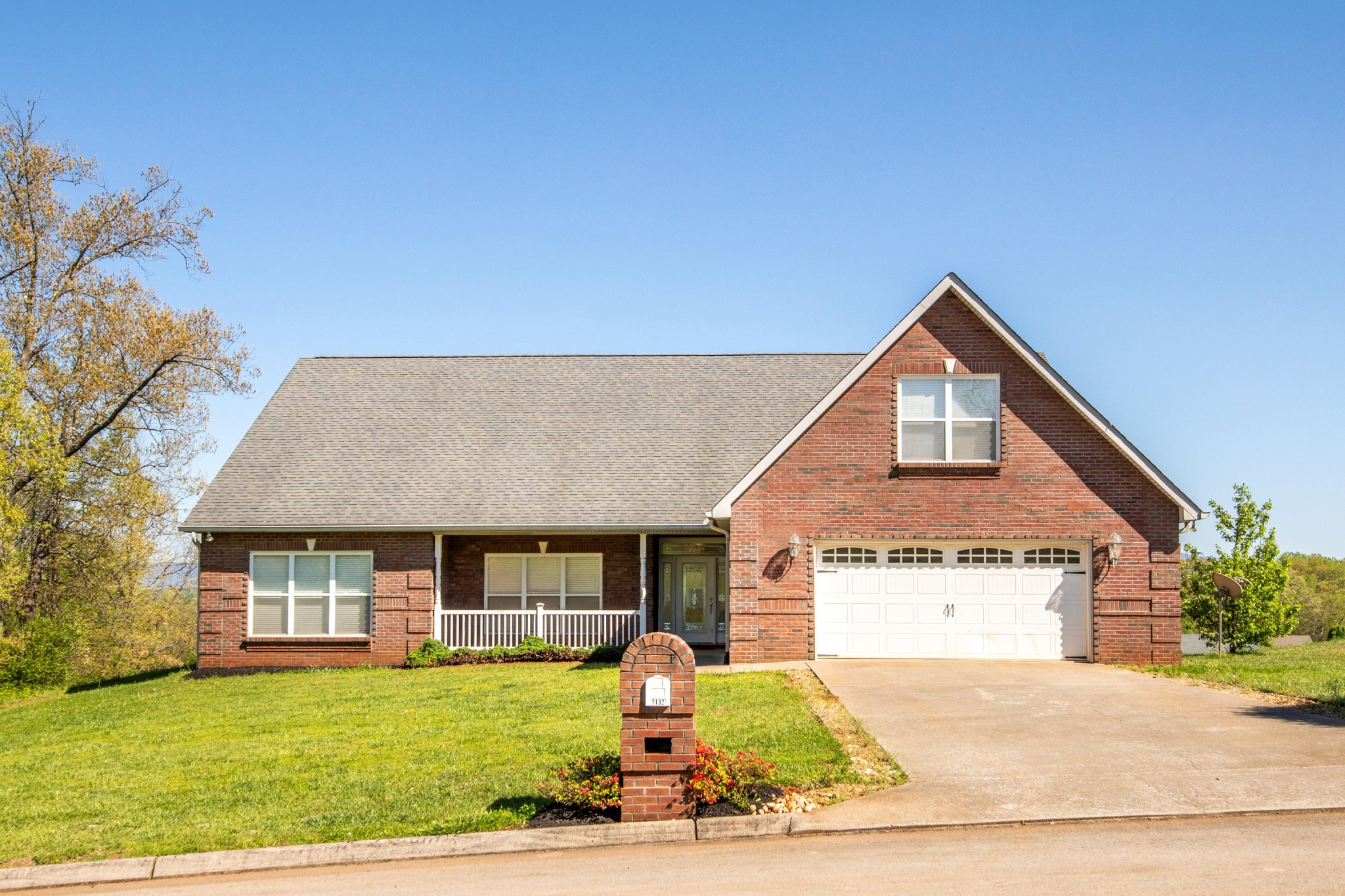 1132 Houston Springs Road Greenback, TN 37742 - Photo 1 of 30 a front view of a house with a yard
