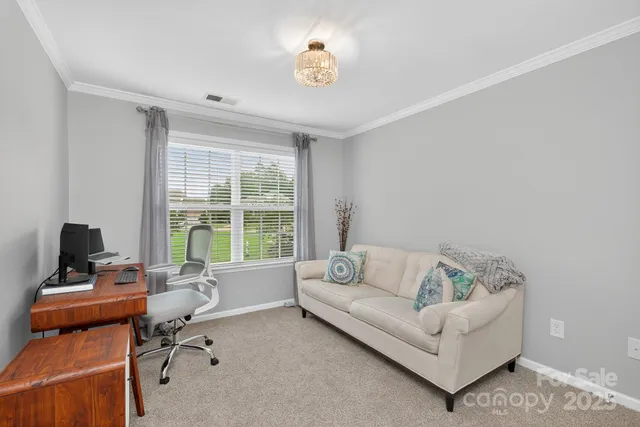 a en suite bathroom with a sink and a mirror