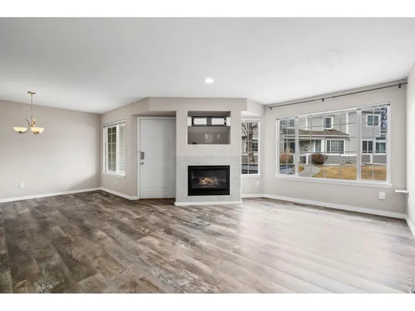 a living room with a fireplace