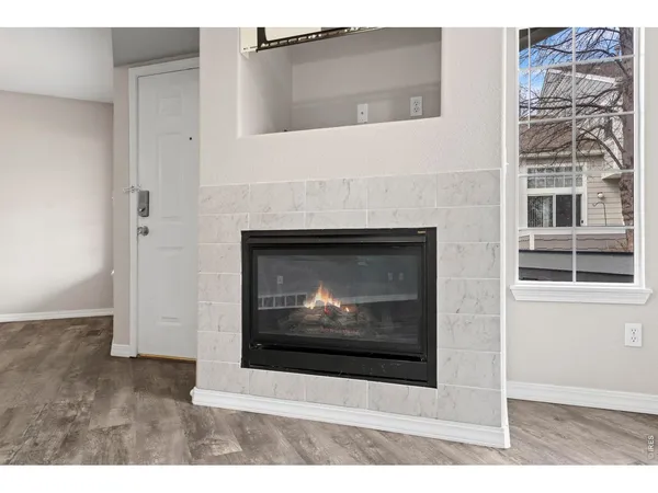a kitchen with kitchen island a sink stainless steel appliances and cabinets
