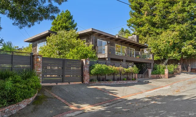 a view of a house with a street