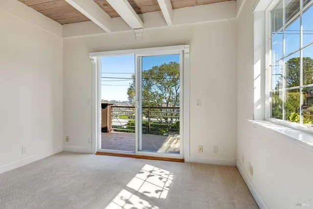 an empty room with windows