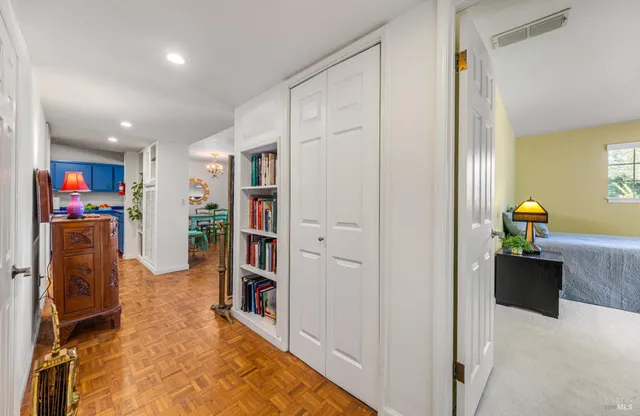 a view of a hallway with workspace