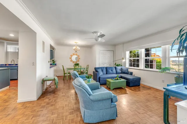 a living room with furniture and a window