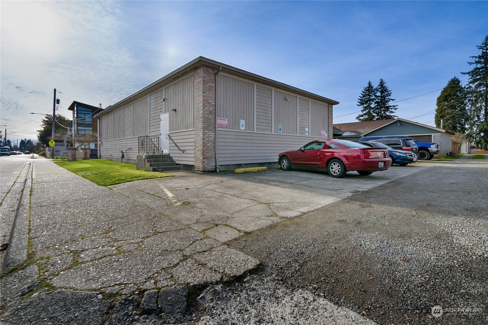 804 North State Street Tacoma, WA 98403 - Photo 34 of 36 a front view of a house with a yard and garage