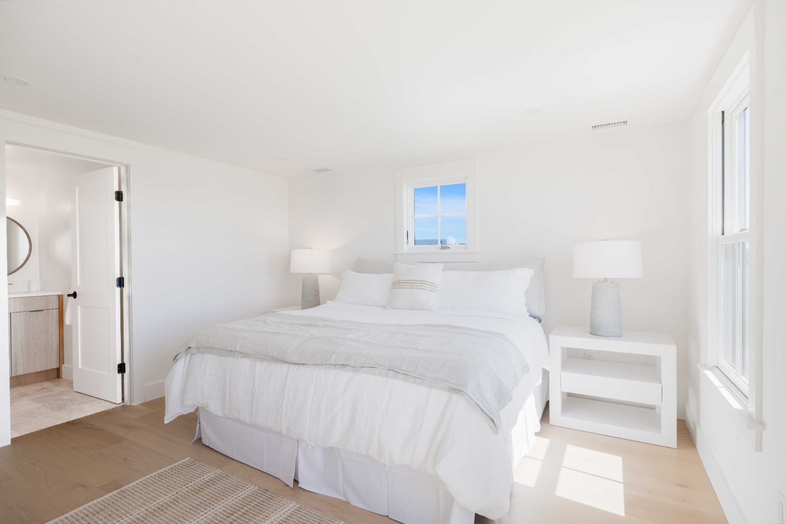 37 Starbuck Road Nantucket, MA 02554 - Photo 18 of 24 a bedroom with a bed and a night stand