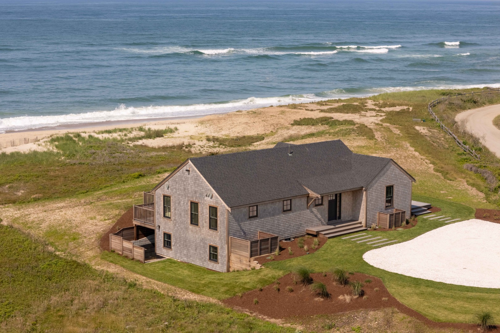 37 Starbuck Road Nantucket, MA 02554 - Photo 3 of 24 a aerial view of a house with a ocean view