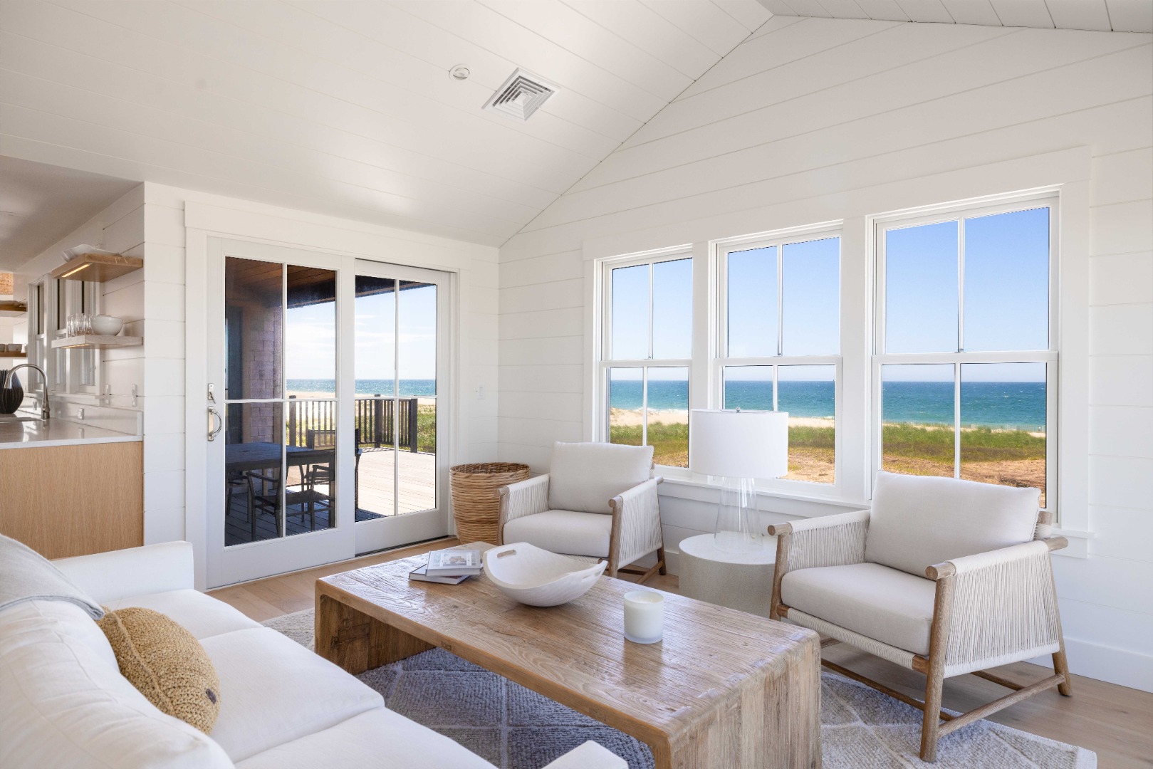 37 Starbuck Road Nantucket, MA 02554 - Photo 6 of 24 a living room with furniture and floor to ceiling windows