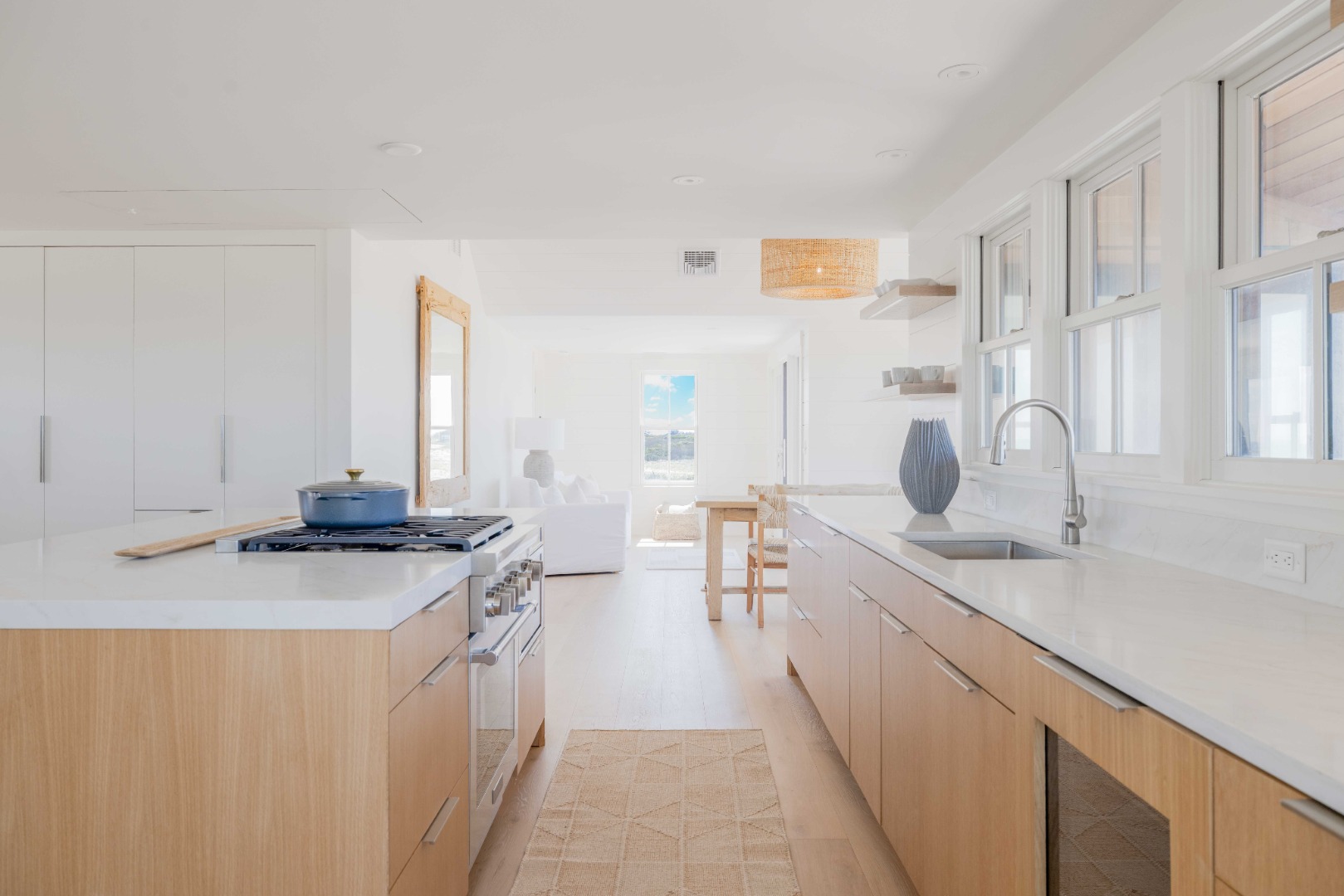 37 Starbuck Road Nantucket, MA 02554 - Photo 8 of 24 a spacious bathroom with a granite countertop sink and a mirror
