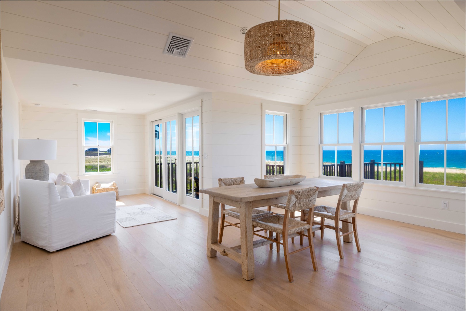 37 Starbuck Road Nantucket, MA 02554 - Photo 9 of 24 a view of a dining room with furniture and wooden floor