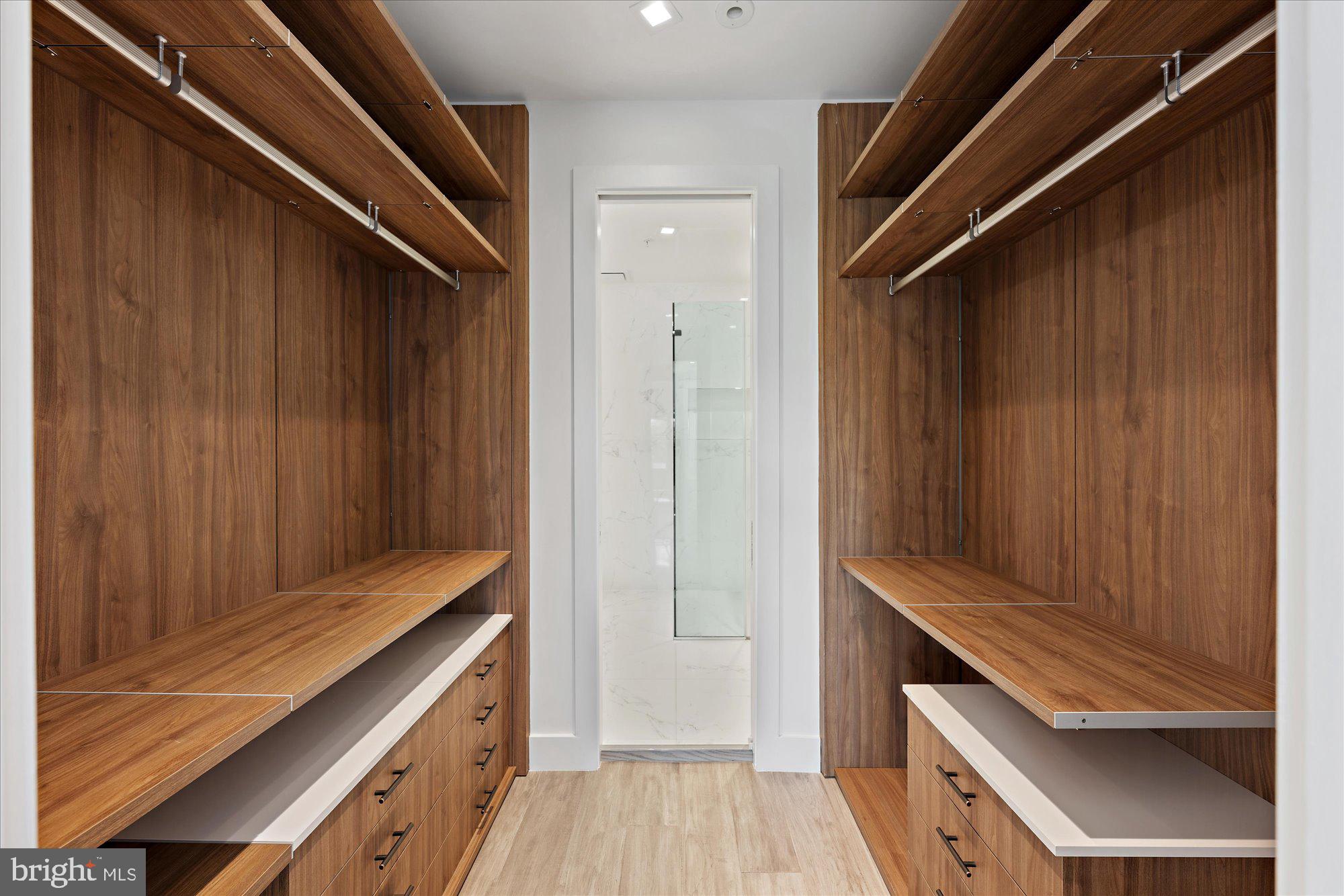 1777 T Street Northwest, Unit 5 Washington, DC 20009 - Photo 35 of 48 a kitchen with a wooden floor and cabinets