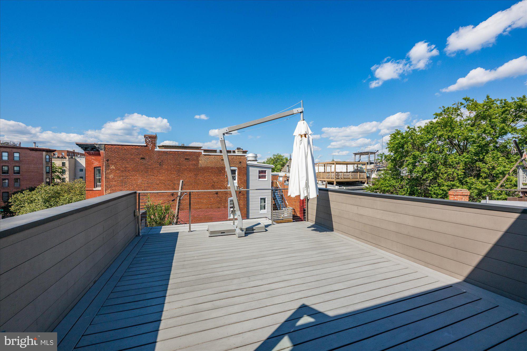 1777 T Street Northwest, Unit 5 Washington, DC 20009 - Photo 42 of 48 a view of a terrace with wooden floor